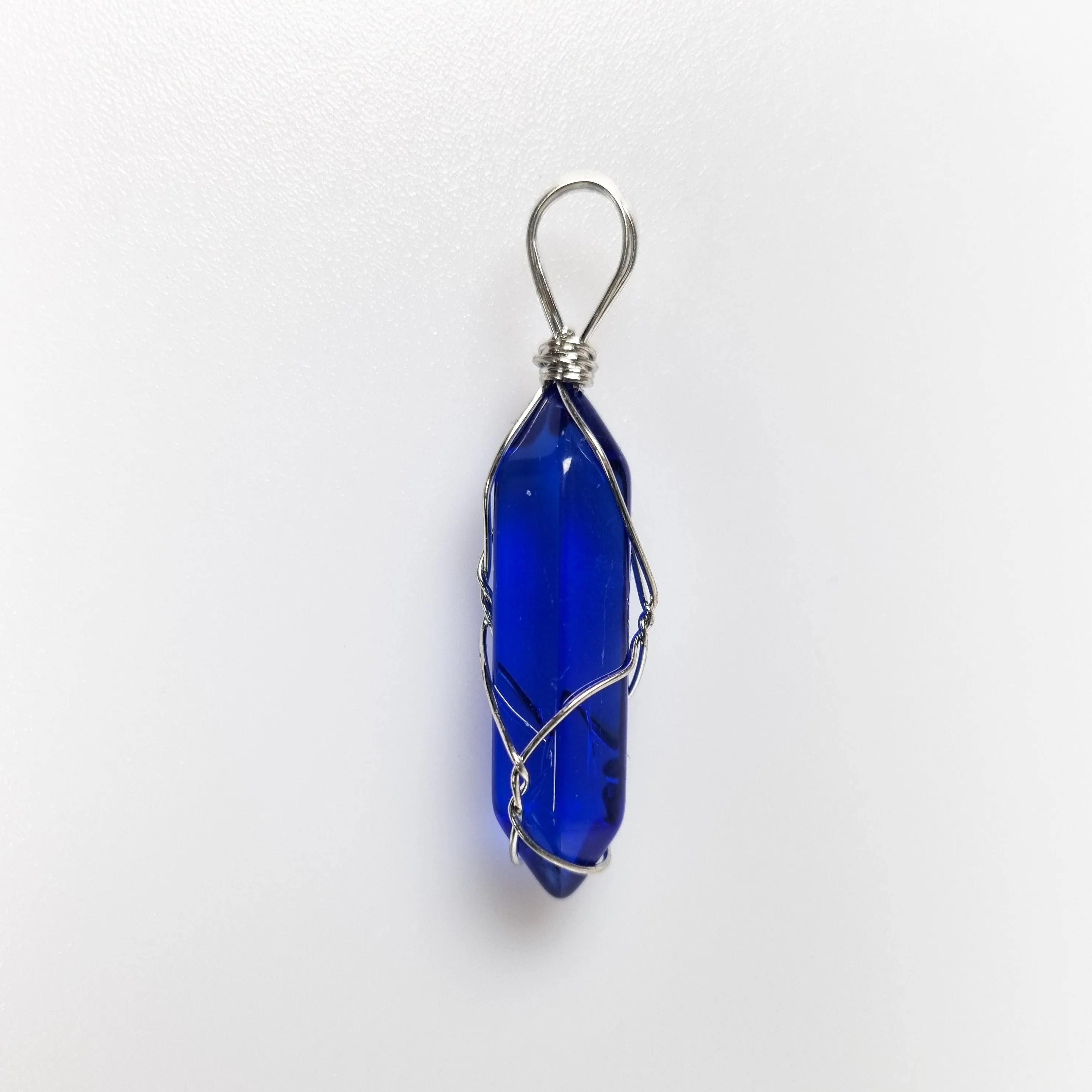 Caged Kyber Crystal Pendants