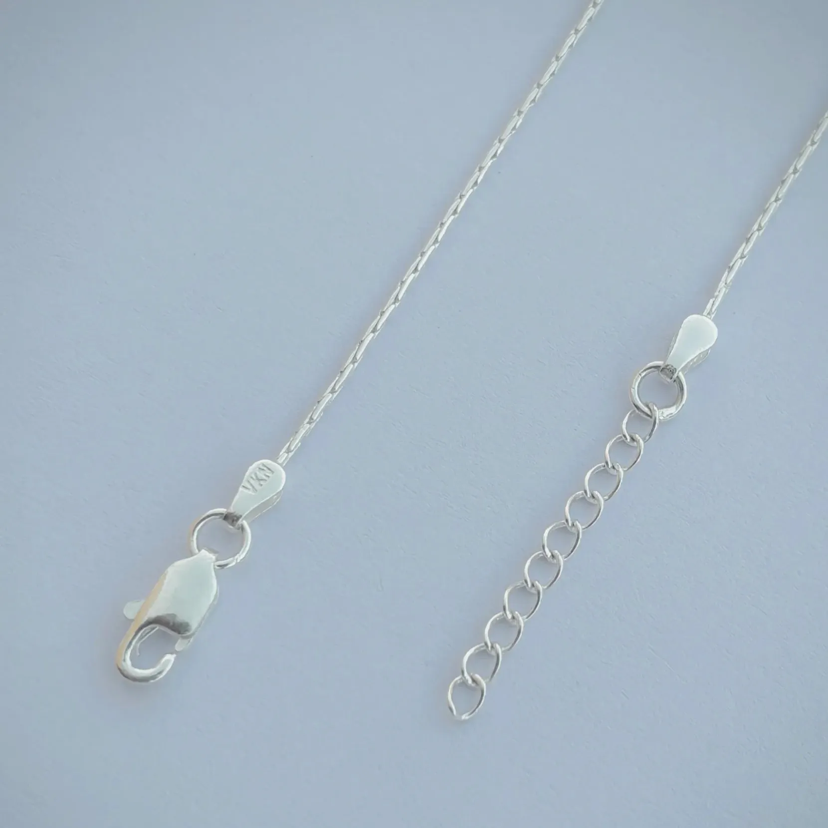 Charming Silver Anklet with Light Purple Moti and Beads.