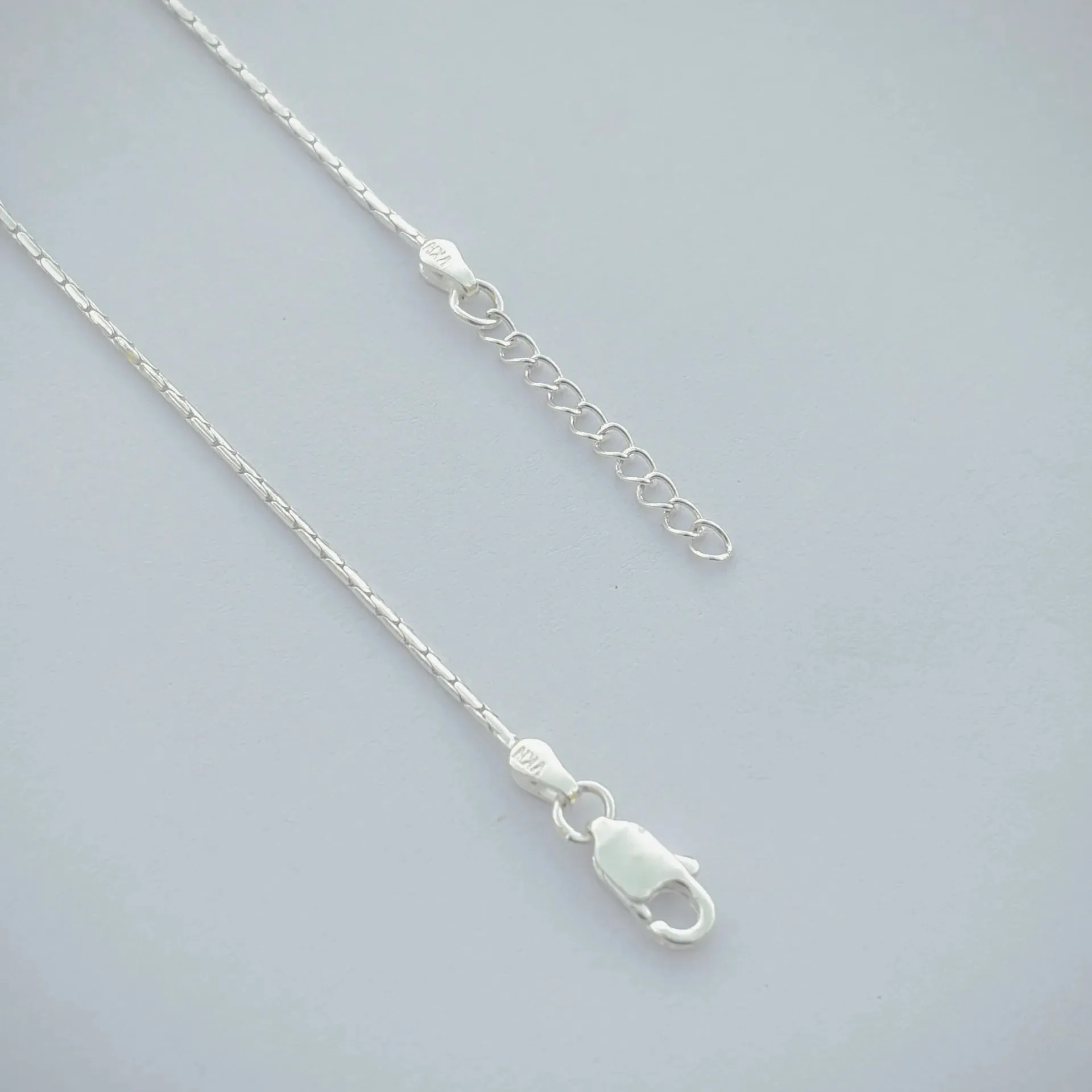 Charming Silver Anklet with Light Purple Moti and Beads.